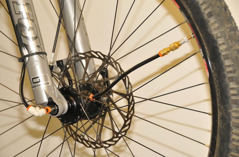 Main image of article ADAPTRAC Adjusts Bicycle Tire Pressure on the Fly