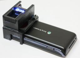 Main image of article This Cell Phone Attachment Detects E. Coli