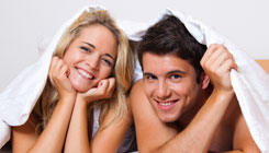 Couple Has Fun in Bed from Bigstockphoto
