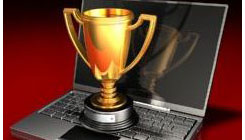 Laptop and Trophy