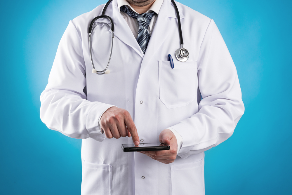 Doctor with Tablet